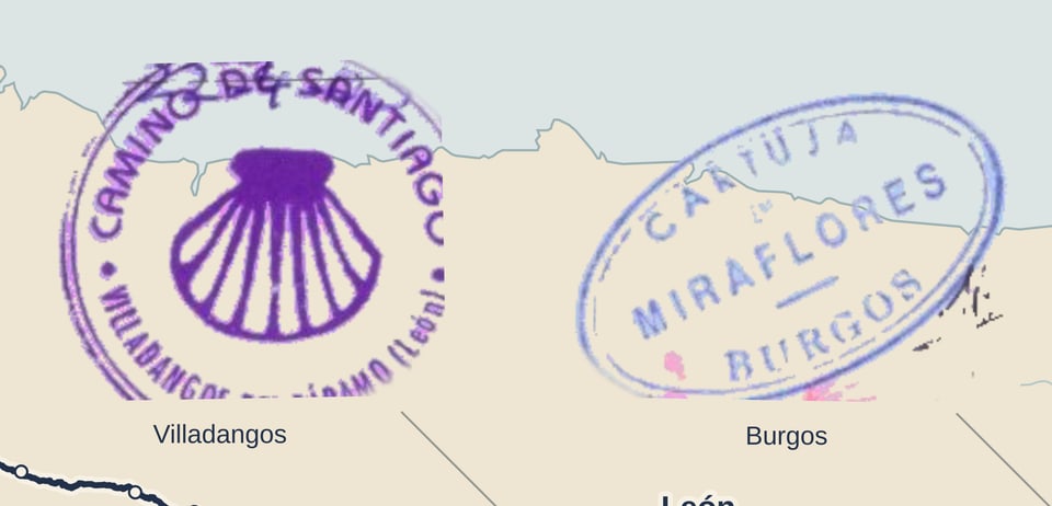 Purple scallop stamp from Villadangos beside the pale blue Miraflores, Burgos stamp, with original worn ink edges.